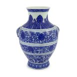 A Chinese blue and white ‘lotus’ vase, hu, Qianlong seal mark but Republic period, moulded with a