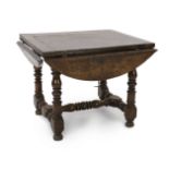 A late 17th century Spanish walnut dining table, the rectangular top with four demi-lune flaps on