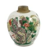 A Chinese famille verte small ovoid jar, Kangxi period, painted with rocks, flowers, foliage and two