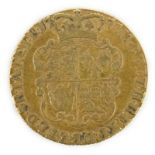 A George III gold guinea 1777, F***CONDITION REPORT***PLEASE NOTE:- Prospective buyers are