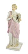 A large scarce Meissen figure of the muse Terpsichore, 19th century, standing and holding a lyre