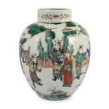 A large Chinese famille verte ovoid jar and cover, 19th century, finely painted with dignitaries