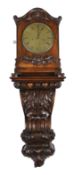 An unusual William IV rosewood wall clock, shaped to look like a bracket clock upon a wall bracket