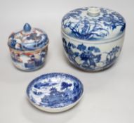 A large Chinese blue and white jar and cover, a similar jar and cover and a dish, large jar and