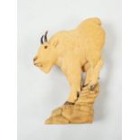 Nick Lamb, a fine cased boxwood okimono carving of a mountain ram, 9cm high