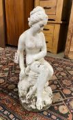 A painted reconstituted stone garden ornament of a female bather, height 63cm