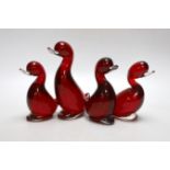 Four Whitefriars ruby glass ducks, tallest 18cm high