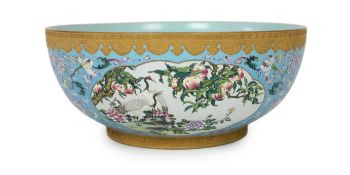 A large Chinese enamelled porcelain fish or punch bowl, Qianlong mark but modern, finely painted