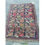 An antique Caucasian Karabagh blue ground rug, 177 x 126cm