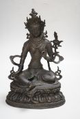 A Buddhist metal figure of ‘Green Tara’, 32cm high