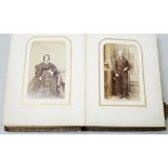 Two Victorian leather portrait photo albums, largest 16cm high, 12.5cm wide