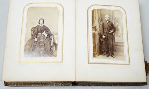 Two Victorian leather portrait photo albums, largest 16cm high, 12.5cm wide