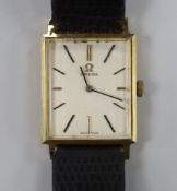 A gentleman's 18k Omega manual wind rectangular dress wrist watch, on associated leather strap, case