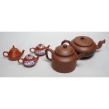 Five early 20th century Chinese Yixing teapots, widest 20cm