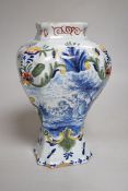 An 18th century Delft polychrome vase, 24cm high