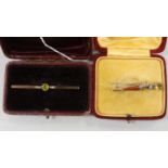 A 9ct, gem and Scottish hardstone set dirk brooch, 45mm and one other 9ct and gem set bar brooch,