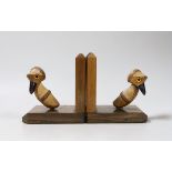 A pair of Henry Howell YZ bird bookends with cherry amber bakelite beaks