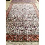 A Turkish ivory ground floral carpet, 360 x 250cm