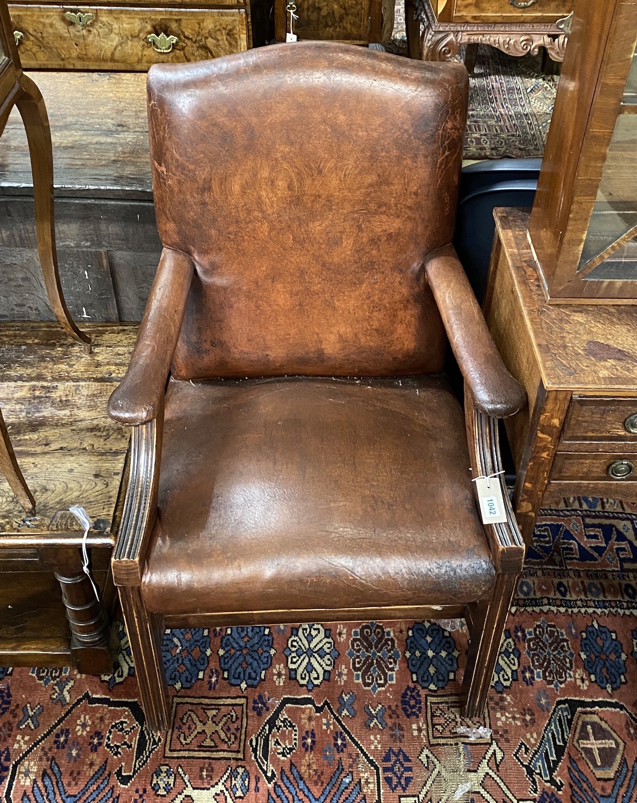 A George III style tan leather beech Gainsborough style chair, width 60cm, depth 56cm, height 95cm - Image 2 of 2
