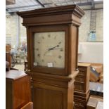 An 18th century oak thirty hour longcase clock by William Kemp and John Holman, Lewes, the 11in.