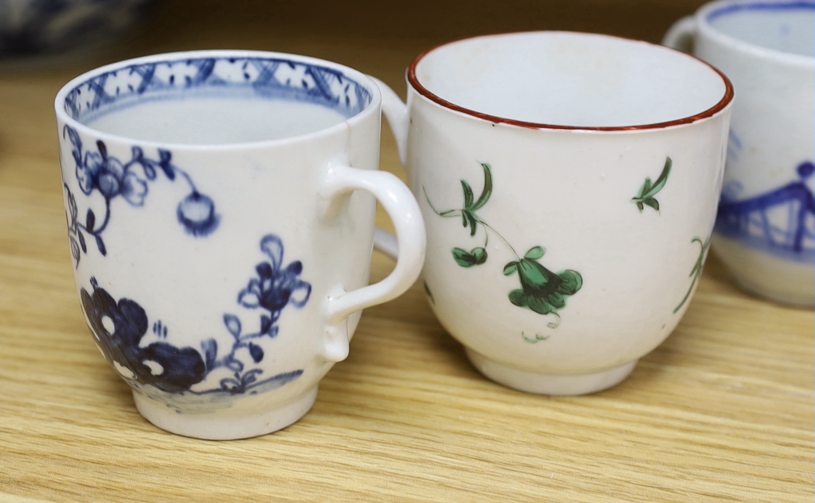 Seven various English porcelain coffee cups, including two Bristol enamelled with green floral - Image 2 of 3