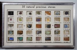 A small presentation booklet containing thirty five natural precious stones.