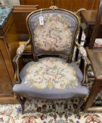 A Louis XVI style tapestry upholstered fauteuil, width 57cm, depth 45cm, height 89cm