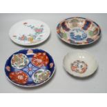 Four Japanese Arita plates/bowls, largest 23cm diameter