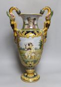 A Nevers faience two handled vase, signed A. Montagnon, 52cm high