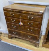 A small 18th century banded walnut four drawer chest with brushing slide, width 78cm, depth 46cm,