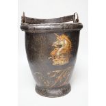 A 19th century leather painted armorial fire bucket, 30cm high