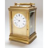 A late 19th century French ormolu, hour repeating carriage clock, with gorge case and enamelled