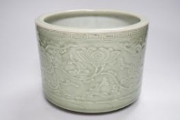 A Chinese celadon glazed tripod brushpot, 19th century Provenance - UK private collection, 1920s
