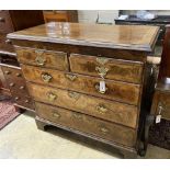 An 18th century feather banded walnut chest of drawers, width 104cm, depth 53cm, height 100cm