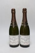 Two bottles of Théophile Roederer 1976