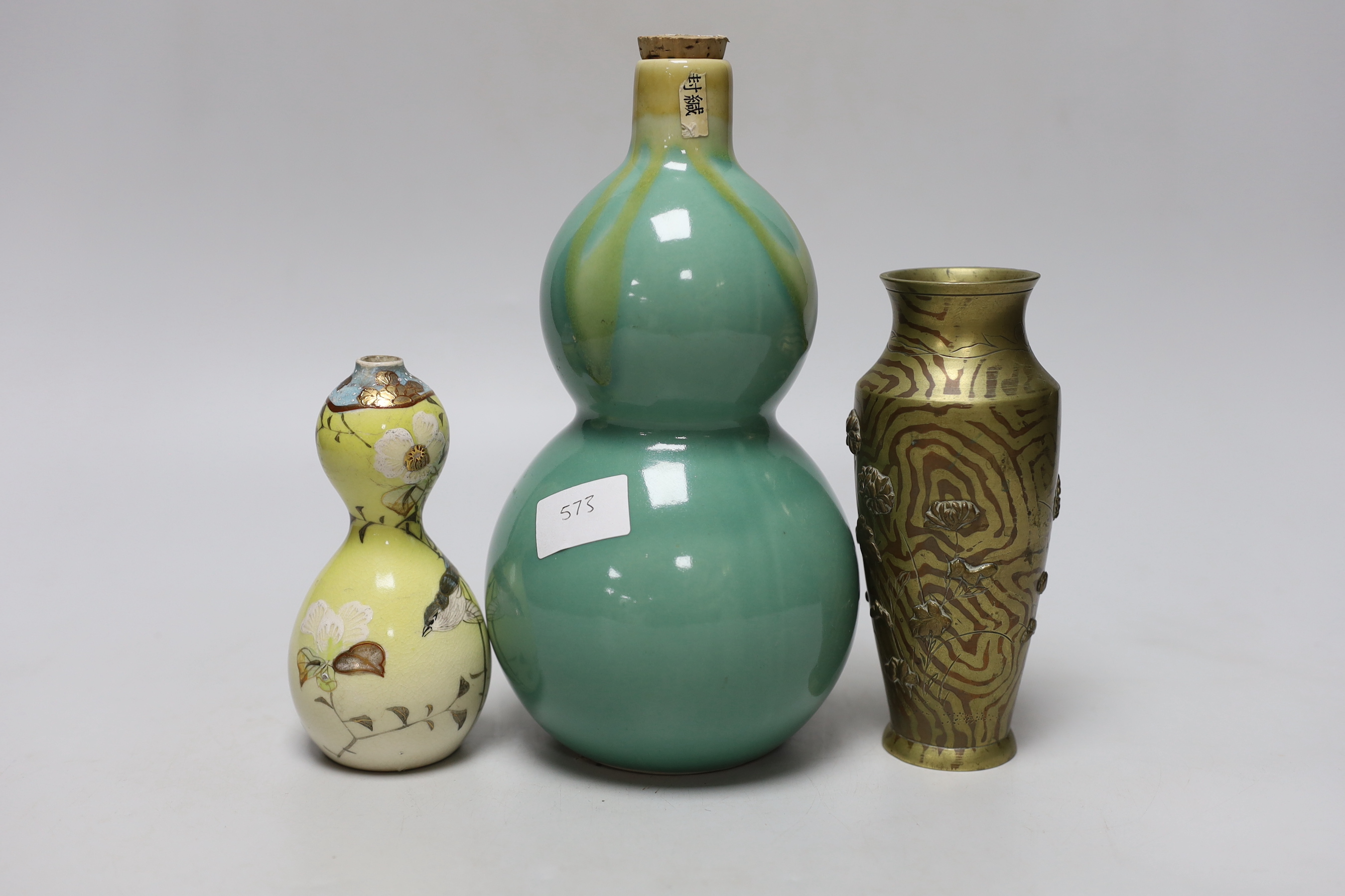 A Japanese bronze faux bois vase, a Satsuma vase and a porcelain tokkuri, a faux bois vase 15cm high - Image 2 of 3