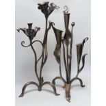 Two wrought iron floral candelabra, tallest 62cm high