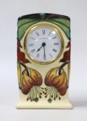 A boxed Moorcroft mantel timepiece, 16cm high