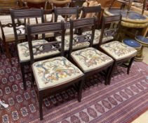 A set of six George IV mahogany dining chairs with tapestry drop in seats, height 85cm