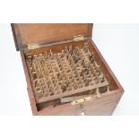 A 19th century cased machine tooling set, 23cm wide, 21cm high