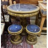 A Chinese style circular glazed earthenware garden table, diameter 80cm, height 76cm and two stools