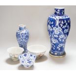 A Chinese prunus vase, a smaller vase and three rice bowls, prunus vase 30cm high