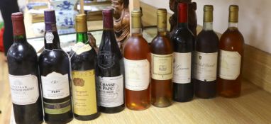 Eight bottles of mixed Cotes du Rhône, Margaux, Pauillac, and Sauternes