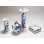 Three Chinese blue and white vases and a wucai square box, one with inscription, 18th century and