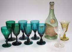 A group of green Georgian and later glass, together with a Napoleon brandy bottle