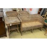 A vintage wicker four piece conservatory suite, settee length 122cm, depth 56cm, height 70cm