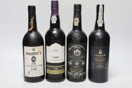 Four various bottles of port