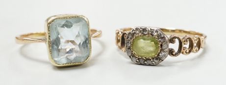 A late Victorian 15ct, peridot and diamond cluster set ring, size M and an Edwardian 15ct and