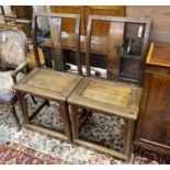 A pair of Chinese elm side chairs, width 54cm, depth 39cm, height 107cm