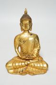 A South East Asian gilt bronze figure of Buddha, 16cm high